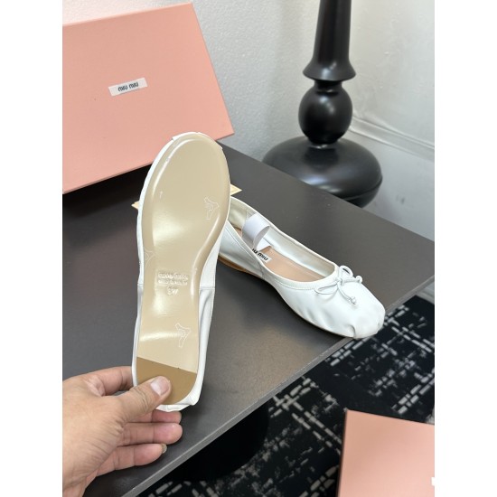 MIUMIU Ballerinas