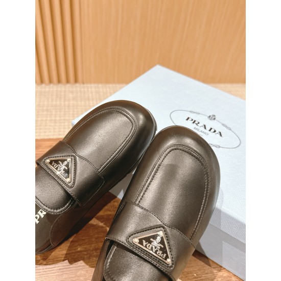 Prada Slippers and mules