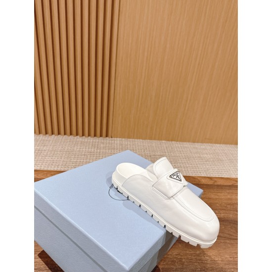 Prada Slippers and mules